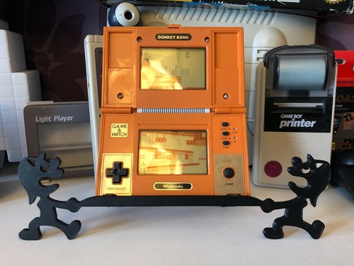 Game watch stand compatible - game,