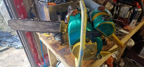 Vintage clinton d25 chainsaw - clinton,