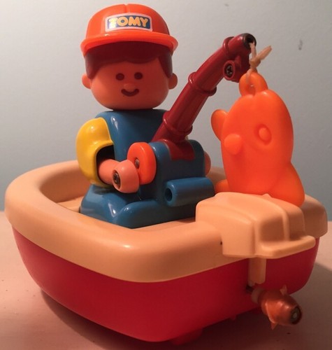 Vintage tomy fishing boat with - fishing,
