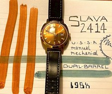 Vintage Slava 2414 USSR mechanical watch with sunburst dial and date
