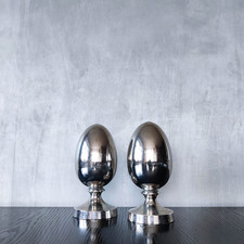 Vintage 00s pair of chrome silver metal finial decorative objects bookends