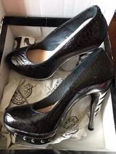 Black Leather Spike Heels by