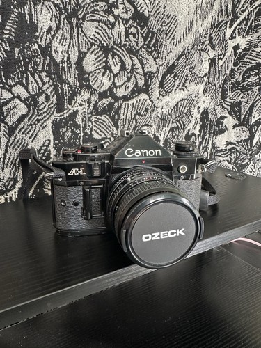 Canon black 35mm slr film - canon,