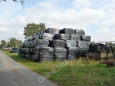 Photo 6x4 A verge full of hay bales Nosterfield Square, round, wrapped, u c2010
