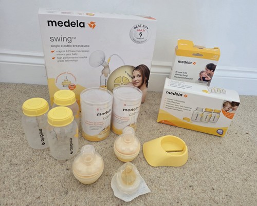 Medela breastpump and - medela,