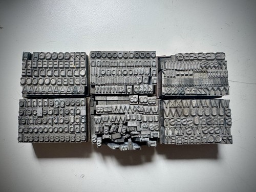 Set letterpress type - of,