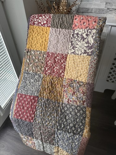 Quilted blanket featuring - featuring, a