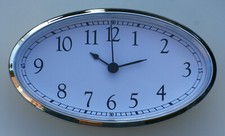 Caravans Clock, Motorhome Clock, Large Oval White Arabic dial Silver Bezel 