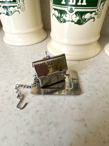 Silver metal tea strainer - tea,