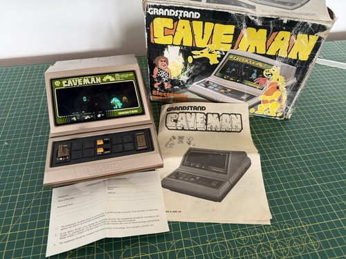 Tomy caveman dinosaur game - tomy,