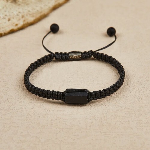 Raw black tourmaline hand - raw,