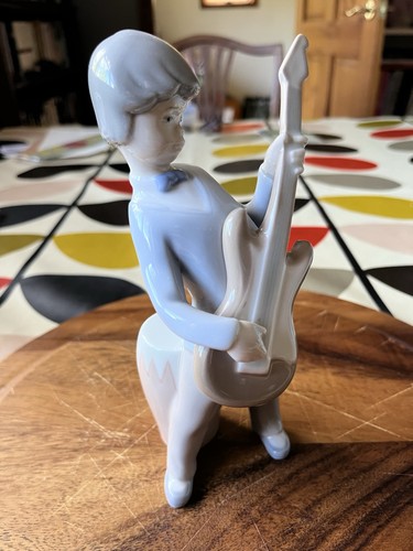 Lladro 4614 boy with guitar - lladro,