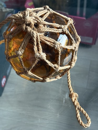 Amber glass fishing - float, —