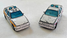 2 x Matchbox Vauxhall Astra GTE / Opel Kadett GSi Police Cars