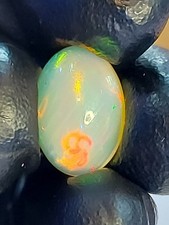 Ethiopian opal 6.72 ct cabochon incredible flashes 