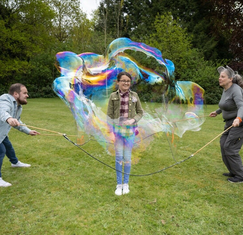 Stand inside giant bubble - a,