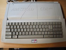 Amstrad CPC 6128+ (PLUS) with manual, module and 5 discs NO MONITOR!!
