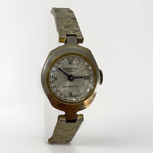 Newmark swiss manual wind - swiss,
