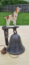 Vintage dor bell with a dog figurine