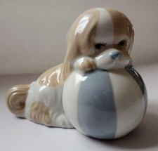 MIQUEL REQUENA "PEKINGESE WITH LARGE BALL"