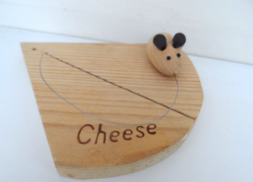 Wooden cheese board with - cheese,