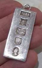 A STERLING SILVER (.925) INGOT