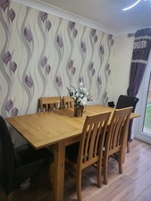 Oak dining set . Extending