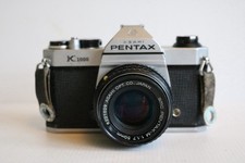 Asahi Pentax K1000 SLR with Pentax SMC 50mm f/1.7 Lens & Case – Good Condition