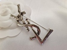 YSL SILVER BROOCH