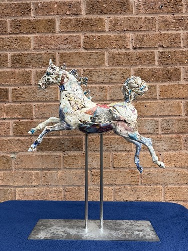 April young carousel horse - april,