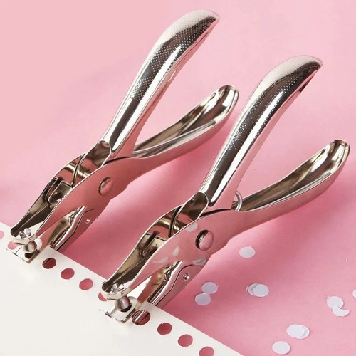 Hole punch metal hand held - hand, one