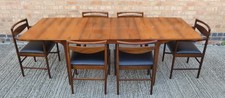 MCINTOSH EXTENDING DINING TABLE & SIX CHAIRS (inc. TWO CARVERS) IN TEAK