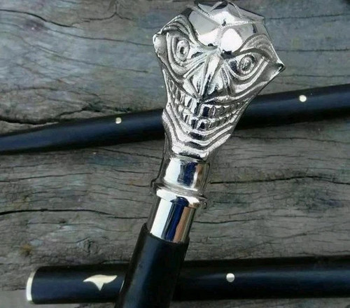 Silver joker head walking - head,