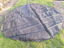 Black Trampoline pad cover base with 72 hooks. Very good cond. 11, 12, or 13Ft ?