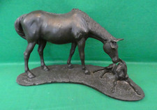 "Mare & Foal" sculpture by the