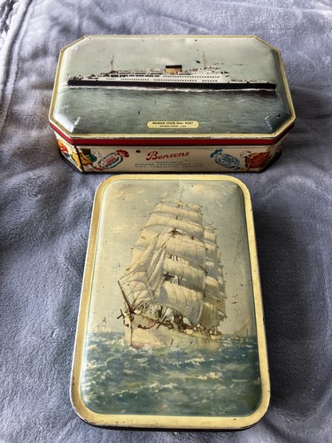 Vintage tins with - , on