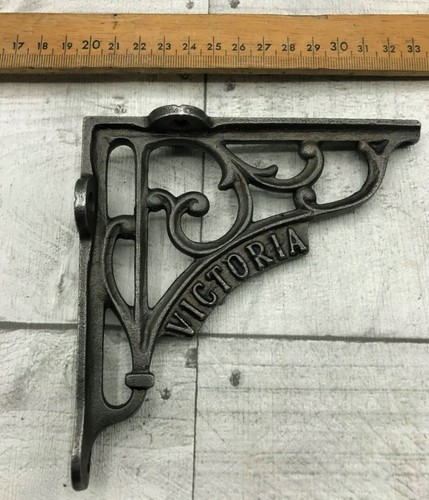 Pair shelf brackets cast - of,
