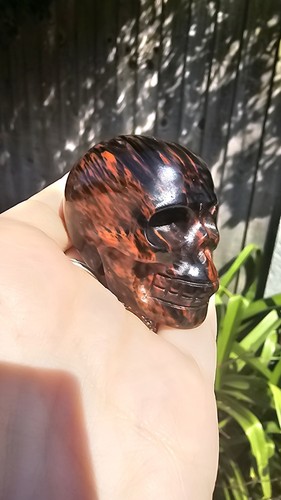 Carved mahogany obsidian - carved,