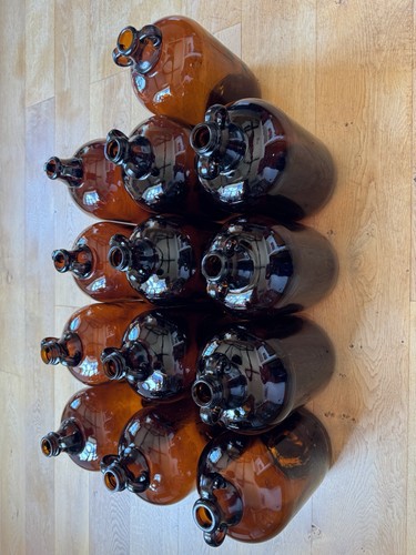 Brown glass demijohns - glass,