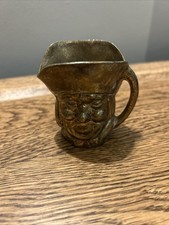 Small vintage brass Toby Jug