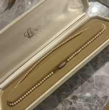 vintage lotus pearl necklace