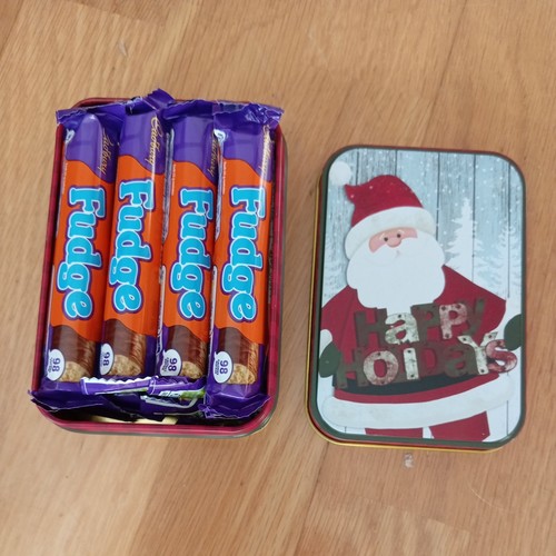 Christmas tin filled with - tin,