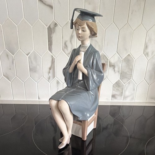 Porcelain graduation figurine - porcelain,