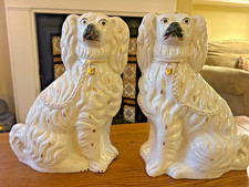 Late Victorian c.1880–1900 Staffordshire seated spaniels - large pair 38 cm tall