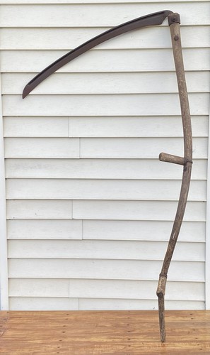Old wooden handle hay scythe - old,