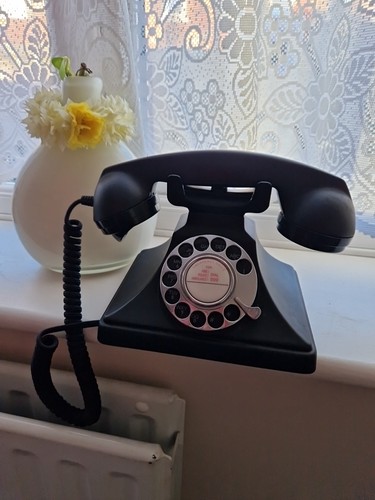 Vintage black rotary phone - a,