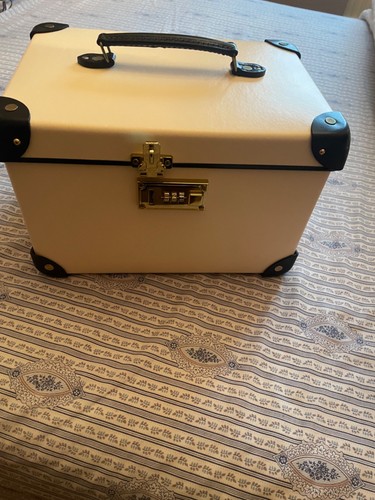Globe trotter ivory and - a,