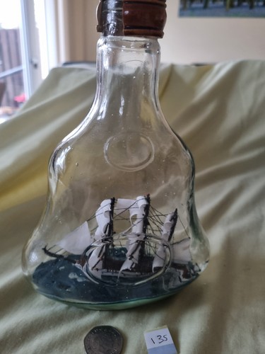 Glass ship bottle with - ship,