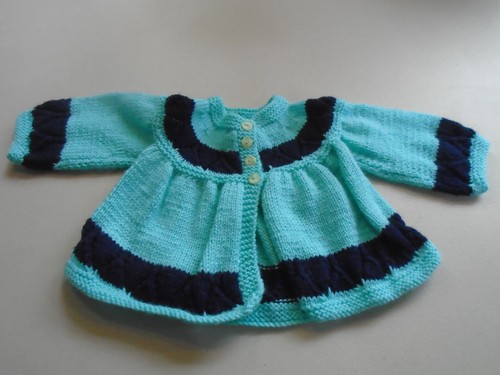 Hand knitted baby - hand,