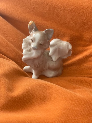 Lladro porcelain papillon dog